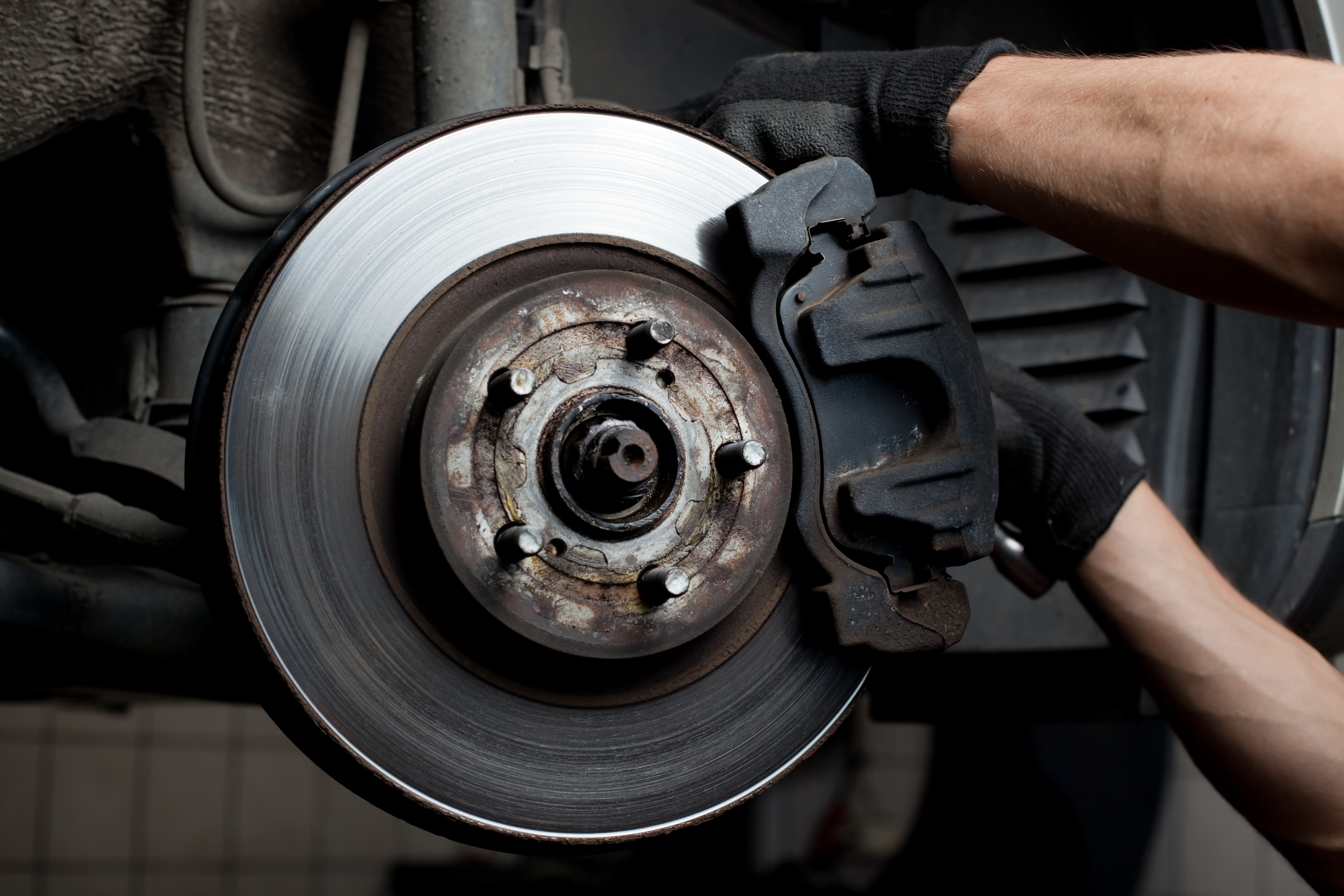 Car mechanic repair brake pads
