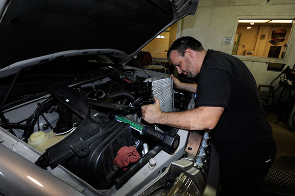 mechanic working on car